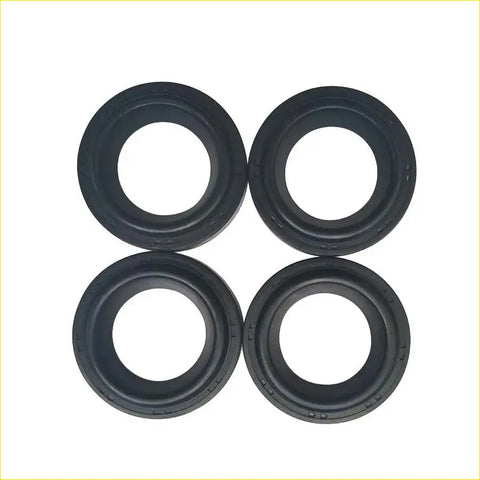 Four black rubber spark plug gaskets arranged in a square for honda accord cd5 f22b1 gasket pro 4pcs kit