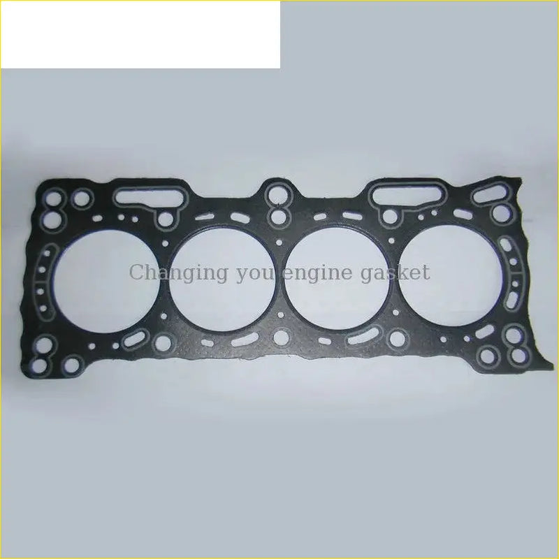 Black engine head gasket with four circular openings and textured surface for honda prelude 16v b20a3 cylinder head