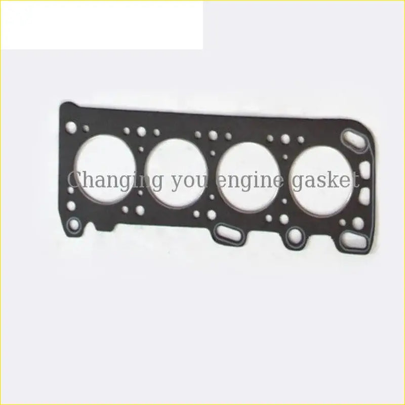 Black engine head gasket with four circular openings and mounting holes for mitsubishi celeste lancer l300 4g33 4g36