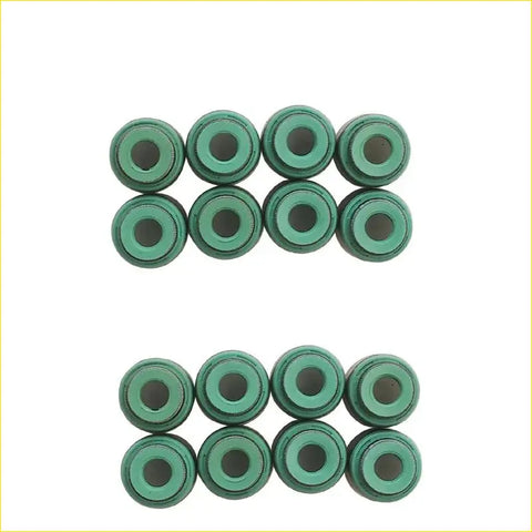 Green metallic valve stem caps arranged in two rows for gasket pro mitsubishi laser galant eclipse turbo engine seal