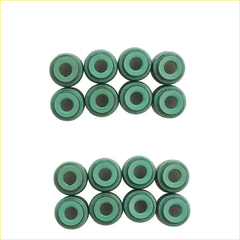 Green metallic valve stem caps arranged in two rows for gasket pro mitsubishi laser galant eclipse turbo engine seal