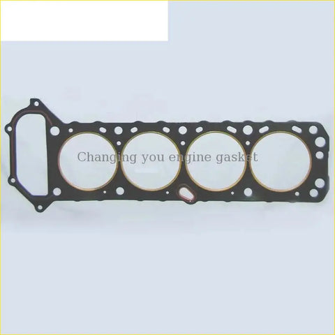 Black gasket pro engine head gasket with four circular openings and gold inner rings for nissan truck 2.0l d21 d22
