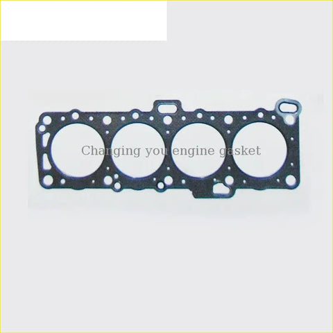 Black engine head gasket with four circular openings and textured surface for nissan cherry pulsar 1.6 cd17 by gasket pro