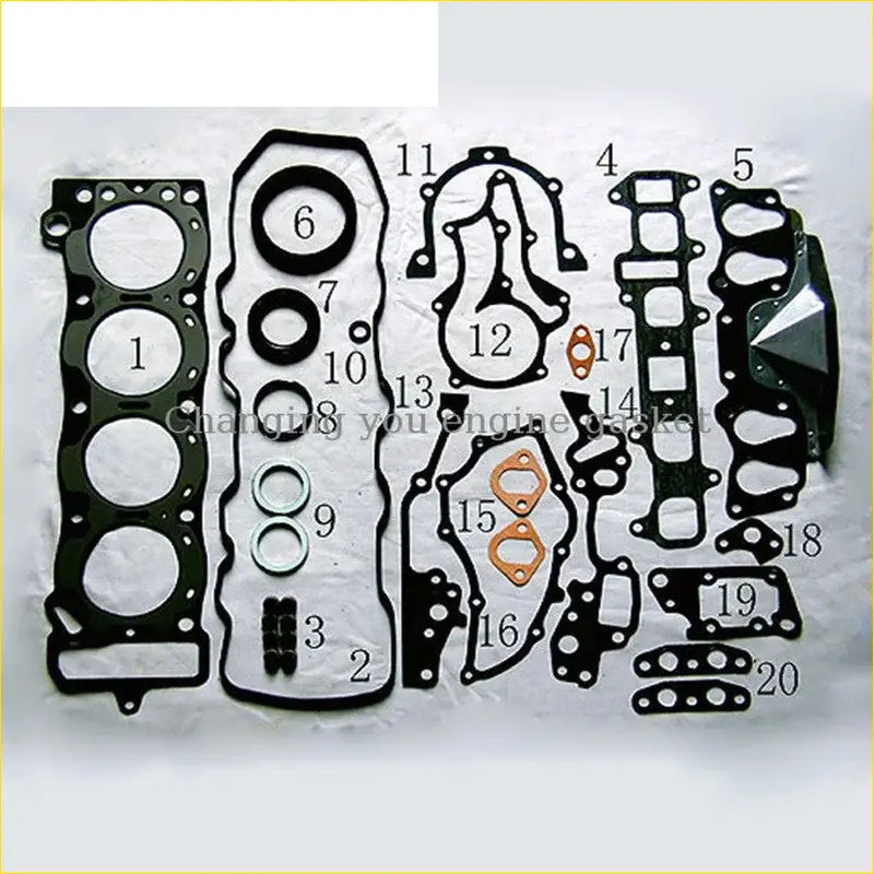 Black rubber engine gasket set with copper metal rings and various seals for toyota corolla mark 2 camry celica 21r