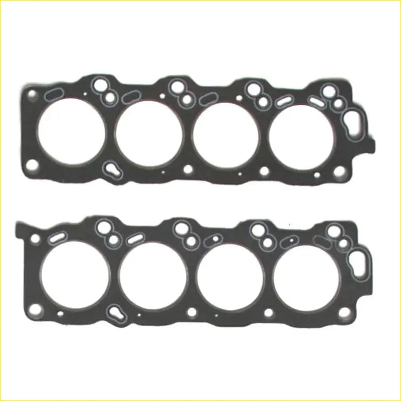 Black rubber engine head gasket with four circular openings and bolt cutouts for toyota crown majesta 4.0l 1uzfe engine