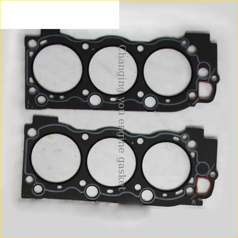 Black engine head gaskets with three circular openings and red accent for gasket pro toyota hilux 5vzte 2pcs shim
