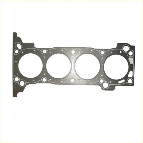 Metallic gray cylinder head gasket with four round openings and textured surface for toyota hilux kijang innova 1trfe engine