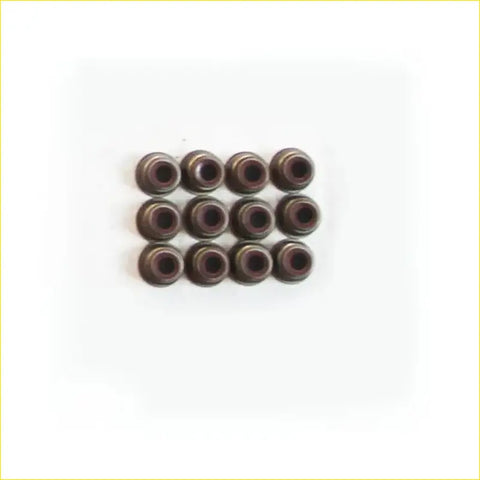 Set of twelve dark bronze metal eyelets for gasket pro used in toyota land cruiser 4.0l 3f valve stem oil seal