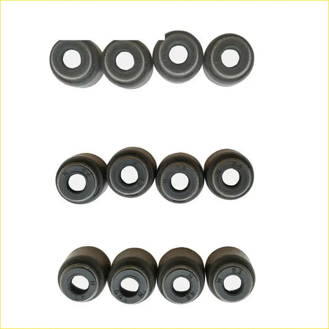 Black rubber gasket pro seals with metallic inner rings arranged in three rows for toyota yaris 1krfe valve stem oil repair