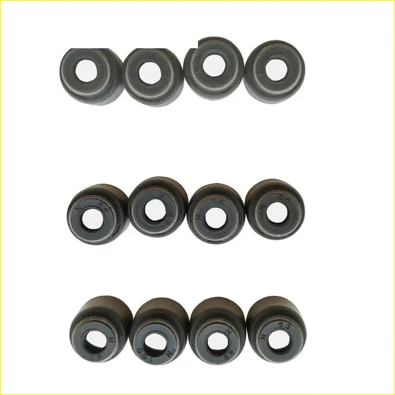 Black rubber gasket pro seals with metallic inner rings arranged in three rows for toyota yaris 1krfe valve stem oil repair