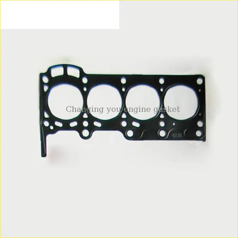 Black engine head gasket with four circular openings and textured surface for toyota yaris echo 1 0 1szfe engine