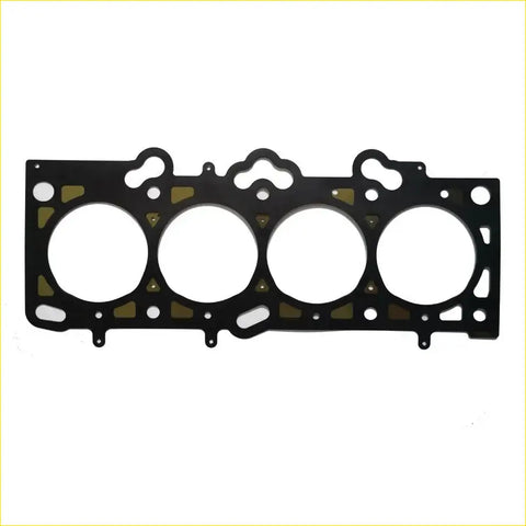 Black metal cylinder head gasket with four circular openings and gold reinforcement patches for hyundai lavita coupe matrix 16v