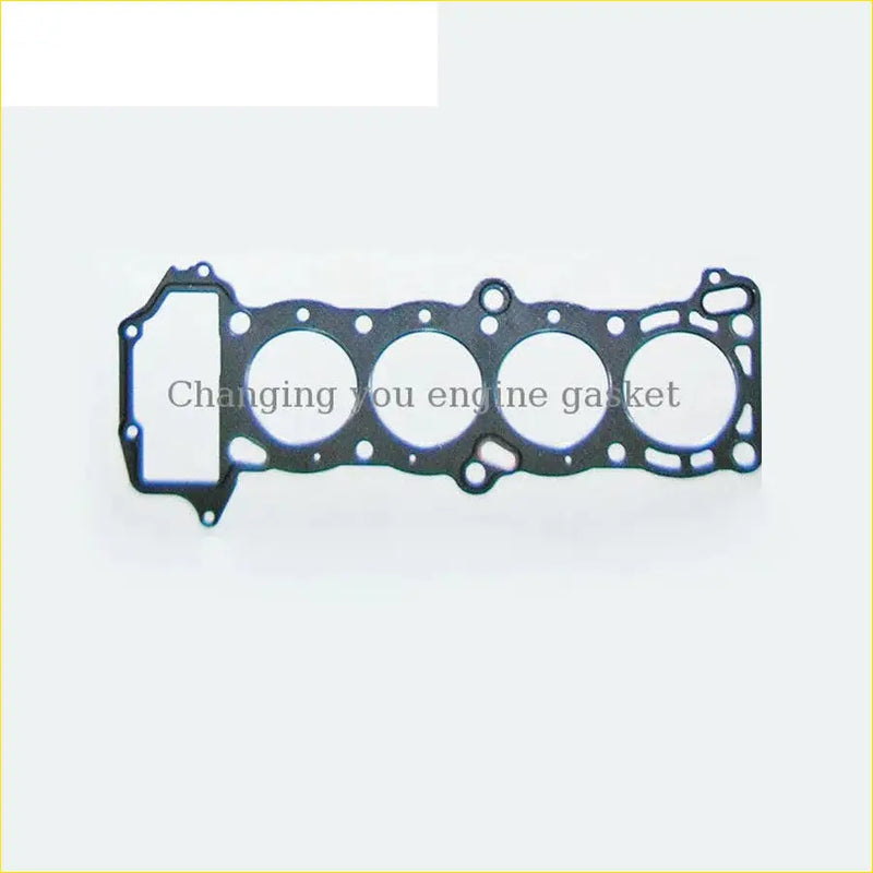 Black rubber cylinder head gasket with four circular openings and mounting holes for nissan sunny coupe b14 engines