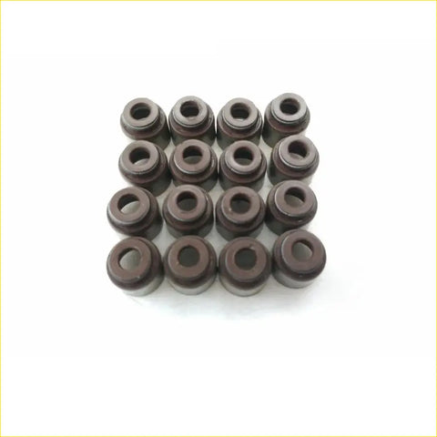 Dark brown cylindrical valve stem oil seals arranged in a grid for nissan sunny gasket pro ga14de ga15de 16pcs set