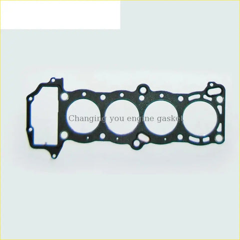 Black engine head gasket with four circular openings and multiple mounting holes for nissan sunny almera 1.4