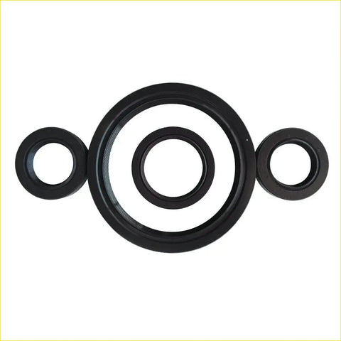 Black rubber gaskets in varying sizes arranged symmetrically for gasket pro honda crv i 16v b20b crankshaft oil seal set