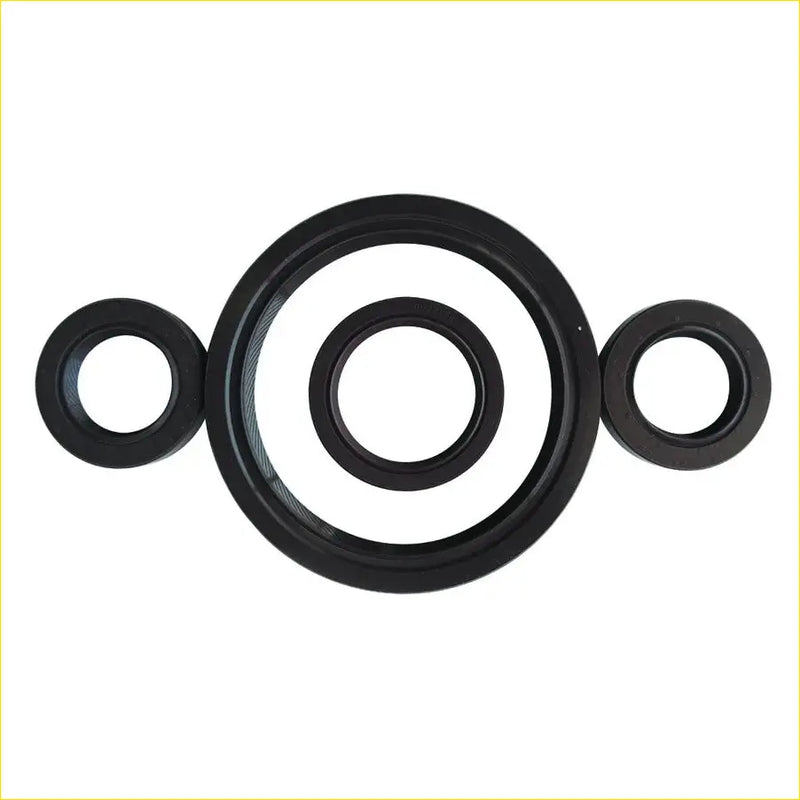 Black rubber gaskets in varying sizes arranged symmetrically for gasket pro honda crv i 16v b20b crankshaft oil seal set