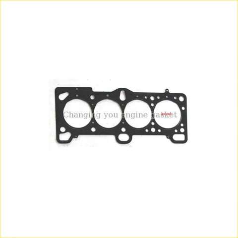 Black metal cylinder head gasket with four circular openings and small edge holes for hyundai accent getz kia pride 1.4 g4ee