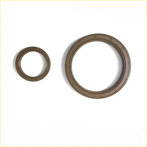 Two brown rubber crankshaft oil seals with textured edges for hyundai h-1 kia sorento i 25 crdi d4cb gasket pro