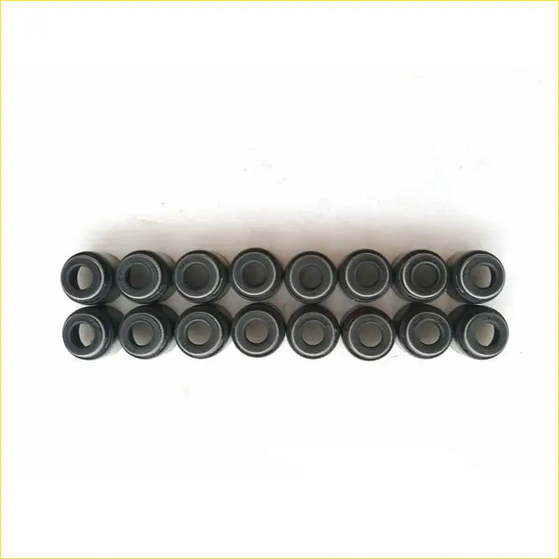 Black cylindrical metal valve stem oil seals arranged in two rows for gasket pro k10a k12a suzuki wagon r plus