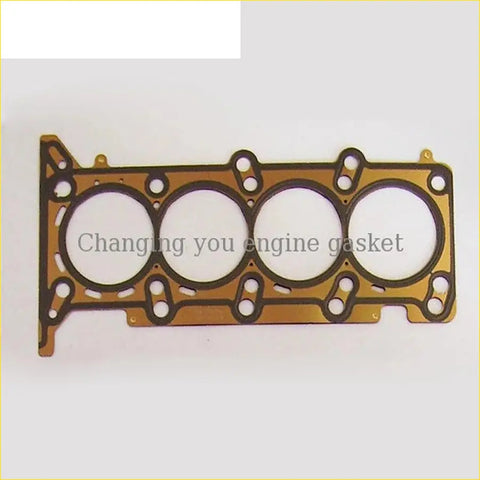 Gold-colored engine head gasket with four circular openings and black sealing for chevrolet sail 1.4l by gasket pro