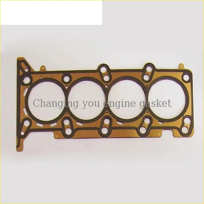 Gold-colored engine head gasket with four circular openings and black sealing for chevrolet sail 1.4l by gasket pro