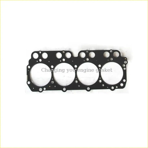 Black metal engine head gasket with four circular openings for toyota coaster xzb53 4.0 from gasket pro