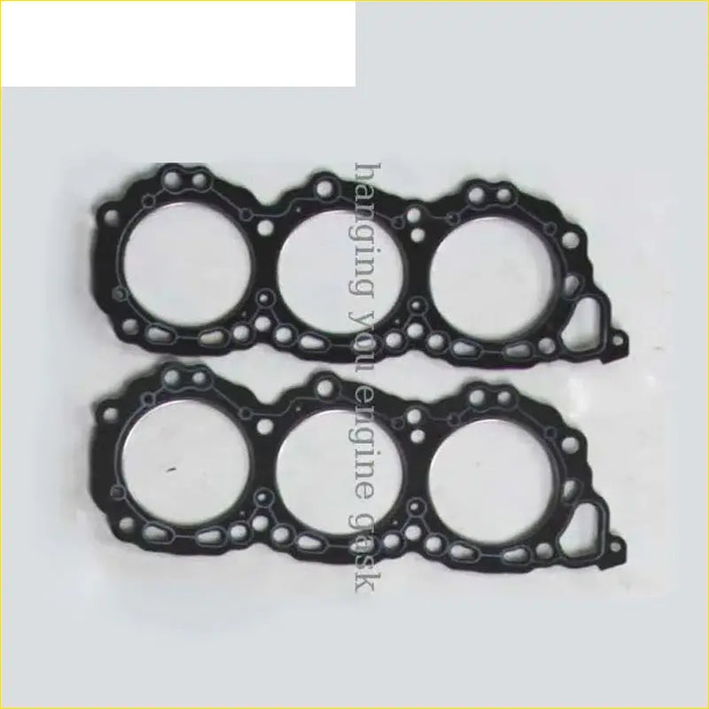 Black engine head gasket with three circular openings and small holes for Nissan Maxima II j30 VG30E engine use