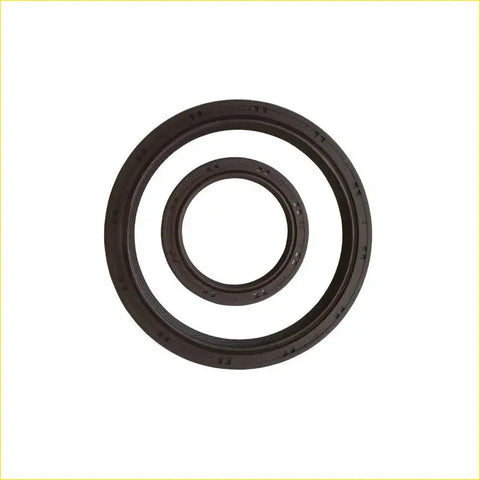 Black rubber crankshaft oil seals with textured edges and embossed markings for toyota aygo 1krfe engines