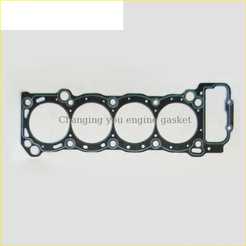 Black engine head gasket with four circular openings and rectangular cutout for toyota hiace iii 2rz 2rz-e engine