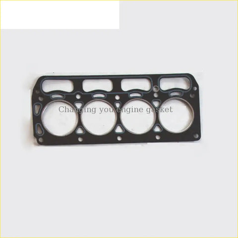 Black engine head gasket with four circular openings and rectangular cutouts for toyota sprinter publica corolla 3k 3kc use