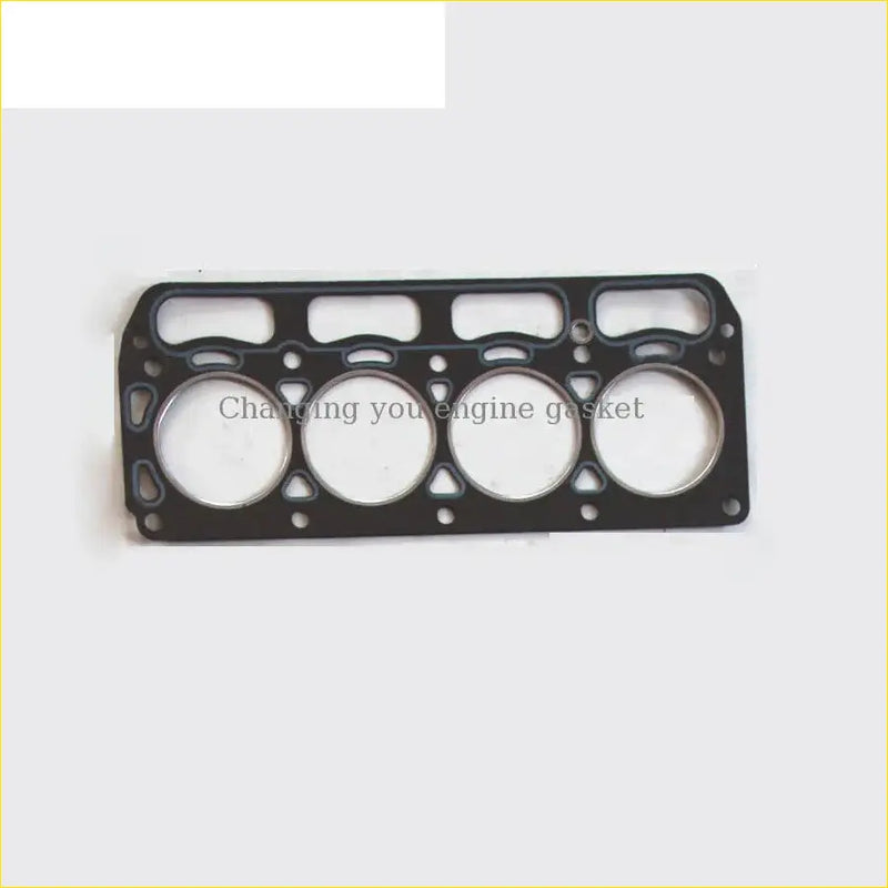 Black engine head gasket with four circular openings and rectangular cutouts for toyota sprinter publica corolla 3k 3kc use