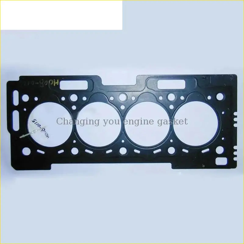 Black metal cylinder head gasket with four circular openings and molded tabs for Peugeot 106 Citroen Saxo 1.6