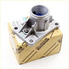 Silver metallic gear shift lever housing with cylindrical inlet and mounting flanges in toyota lexus genuine parts box