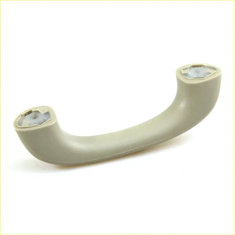 Beige plastic grab handle with molded grip and circular mounting holes for toyota hilux sr5 mk6 2004-2013