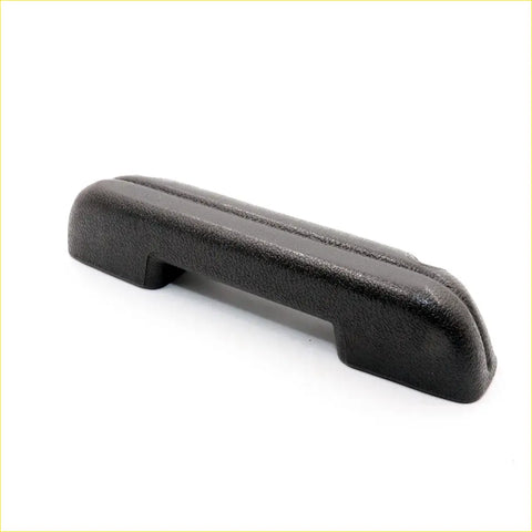 Black textured plastic door handle grip shown from the back for gray armrest on mazda bravo ranger models