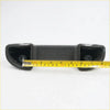 Gray armrest for mazda bravo with black textured plastic handle featuring two circular cutouts and central grip section