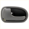 Gray lh door handle for mazda b-series b2000 with smooth rounded black plastic grip and integrated design