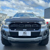 Silver ford ranger px2 2016-2018 with black front grille and rugged off-road tires for tough outdoor use