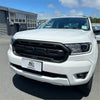 White ford ranger with a black grille and sleek headlights featuring grille for ford ranger px3 xl xlt sport 2019-2021