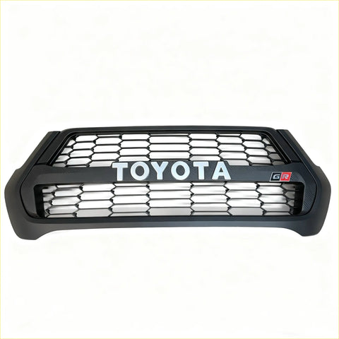 Black toyota gr grille for hilux 2021-2024 sr sr5 with honeycomb mesh pattern and silver lettering