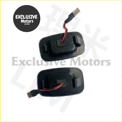 Black plastic car door handle light fixtures with red and black wiring for toyota hilux guard indicators x 2 back side