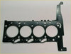 Black engine cylinder head gasket with four circular openings and bolt cutouts for defender transit convoy tx4 2.4
