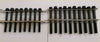 Black coated engine bolts arranged in two rows on a metal rack for head gasket set ford ranger 12v 25td 25d