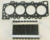 Black engine head gasket with four circular openings and matching black threaded bolts for navara d22 d40 cabstar Pathfinder NP300 2.5 DCI