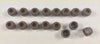 Brown rubber grommets in two rows for head gasket and bolts set for jeep wrangler on white surface