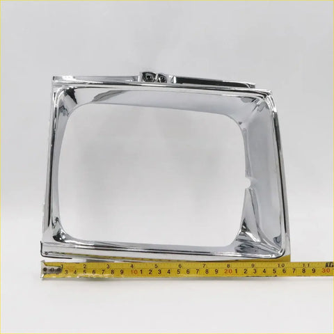 Chrome finished rectangular head light door trim for toyota hilux 4wd 1988-1997 with sleek polished metal surface