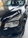 Black glossy headlight cover for holden colorado 2012-2016 with sleek angular design and clear lens housing matte finish
