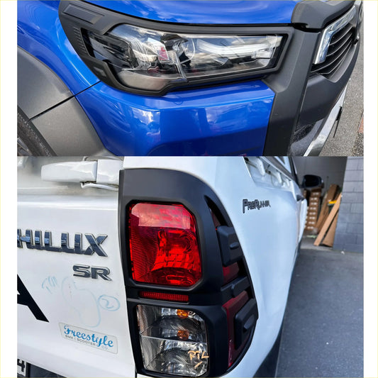 Blue and white toyota hilux sr pickup trucks with matte black plastic headlight and taillight covers 2025 model