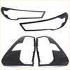 Black plastic matte headlight and taillight covers for toyota hilux 2025 sr5 trim pieces shown from back side